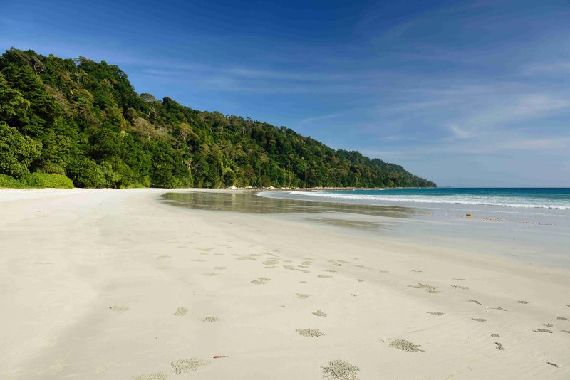 picturesque flat white sand beach perfect for skim boarding.